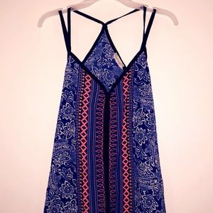 A floral and Aztecan print strappy shirt